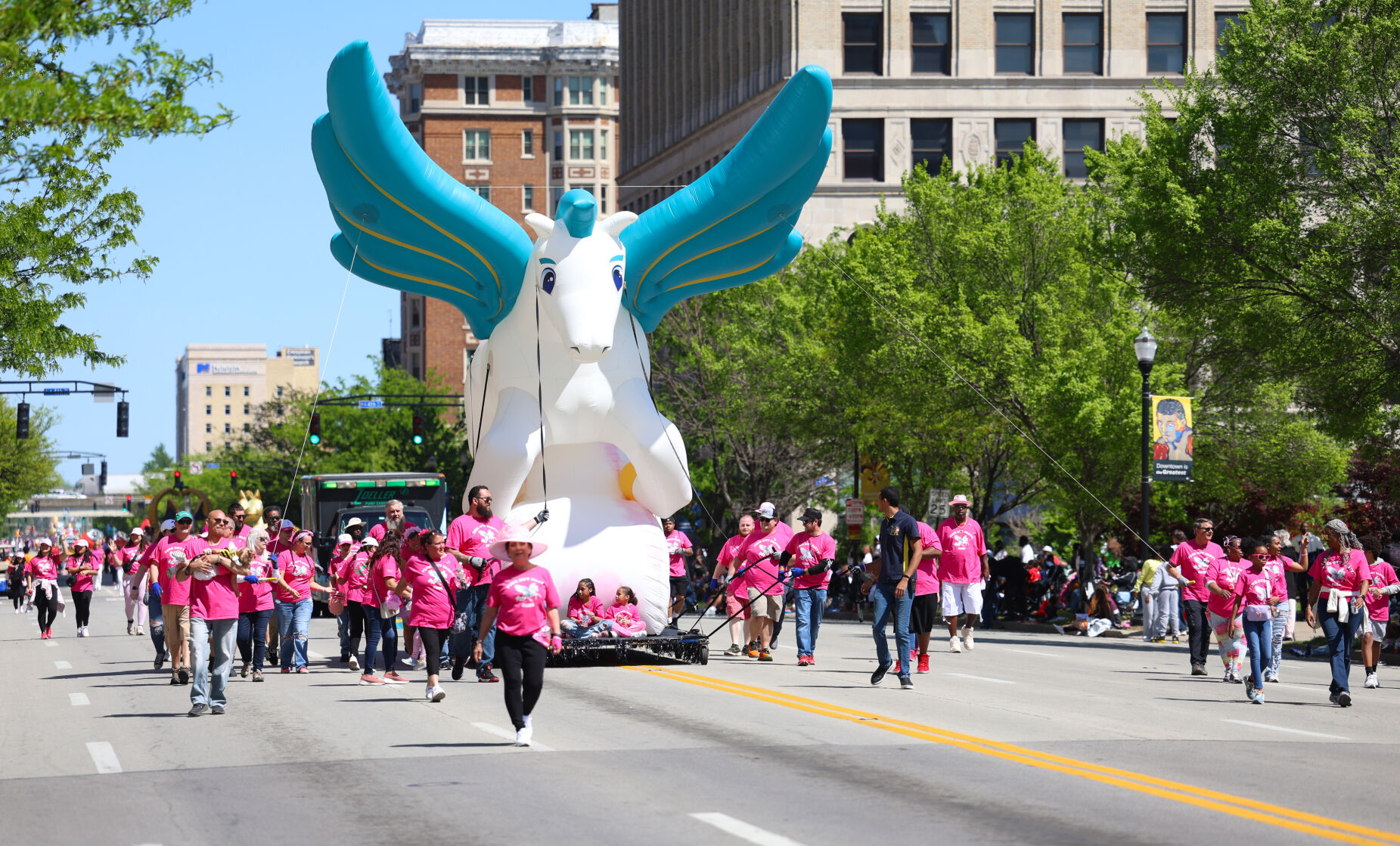 Pegasus Parade moves down Broadway.JPG